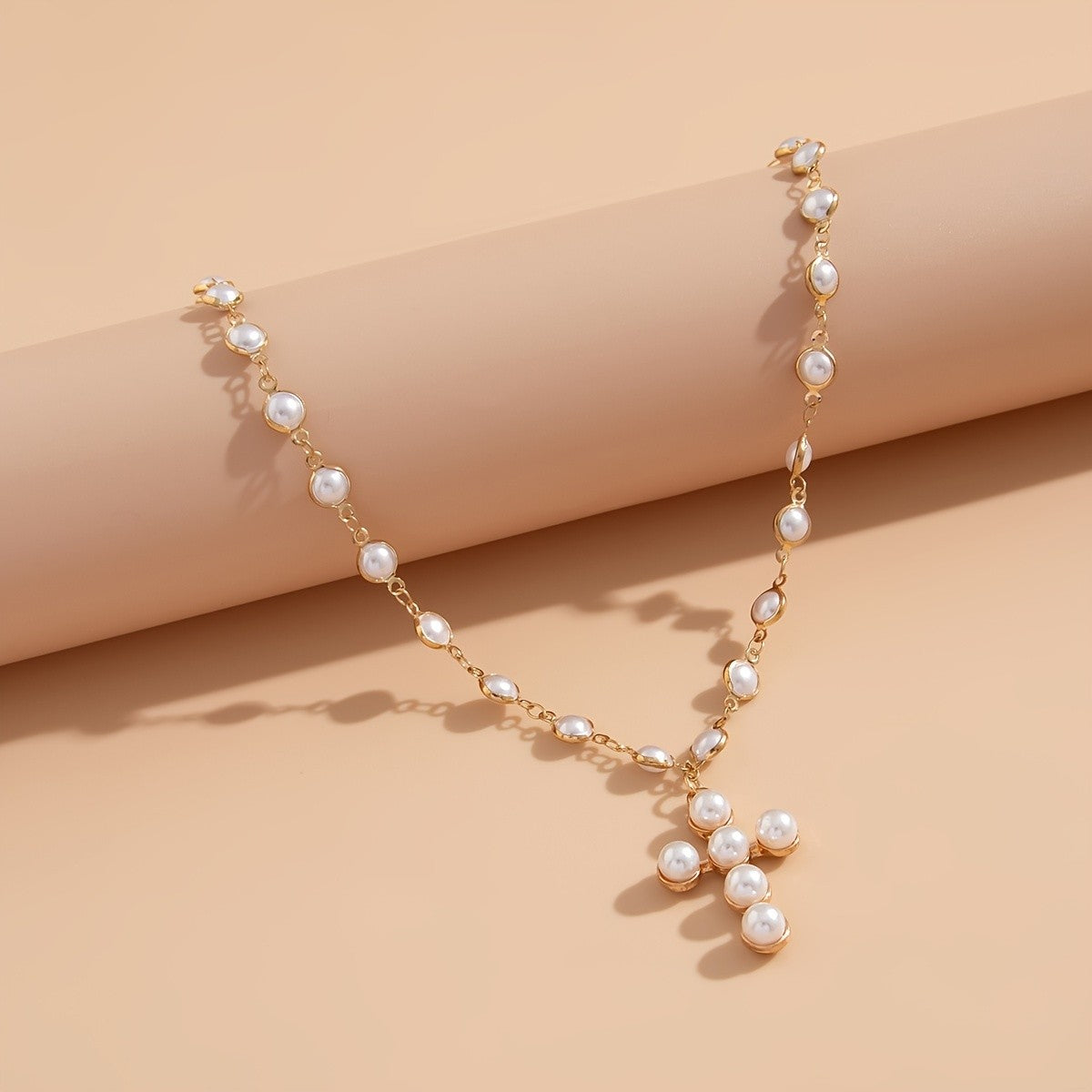Elegant Pearl Cross Necklace