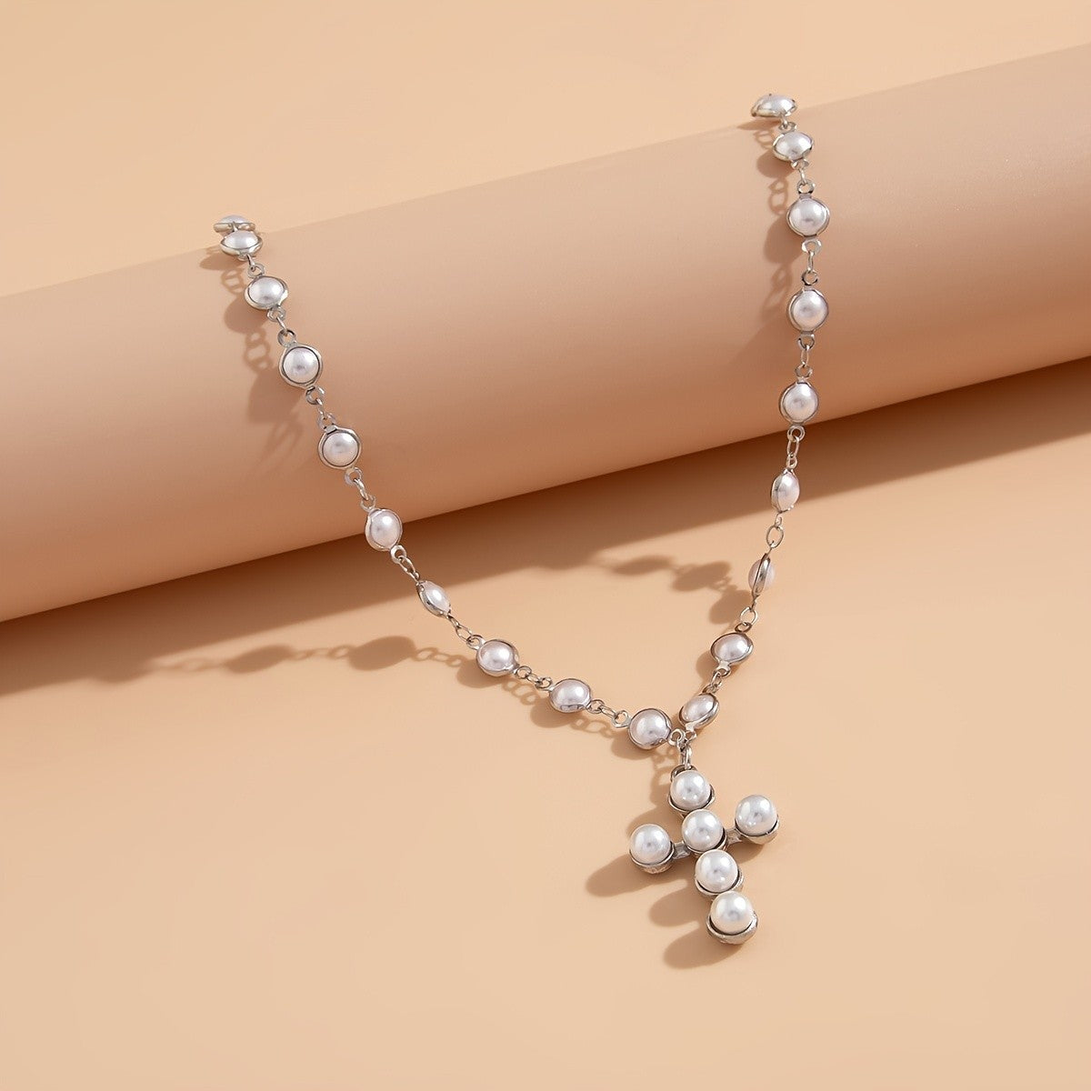 Elegant Pearl Cross Necklace