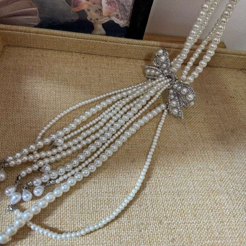 Elegant Pearl Bow Tassel Necklace