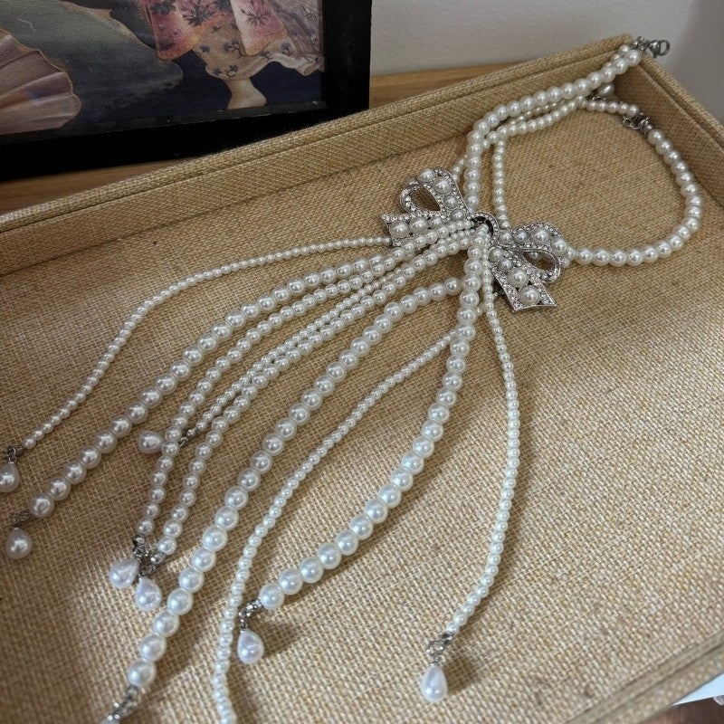 Elegant Pearl Bow Tassel Necklace