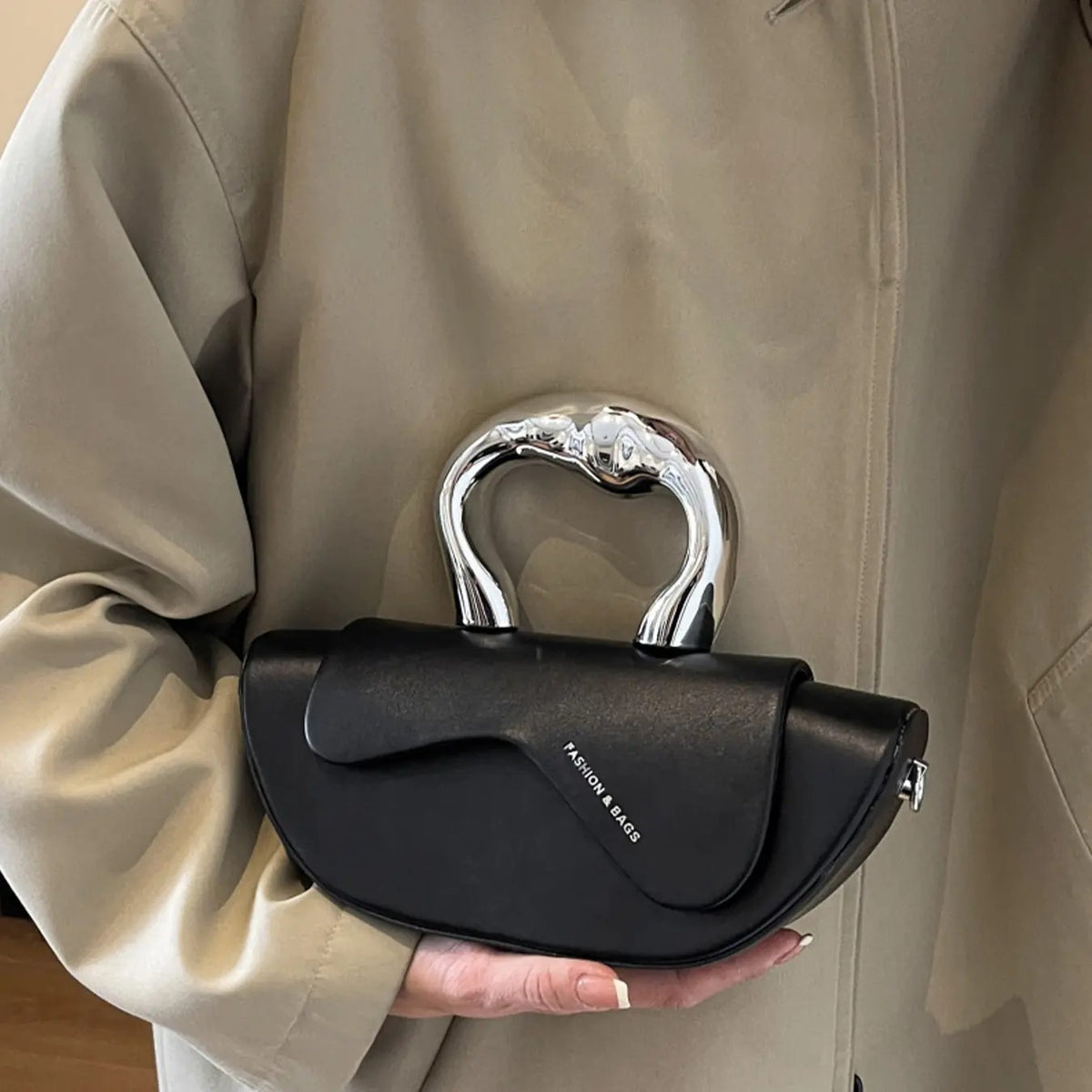 Elegant Sculptural Handle Bag